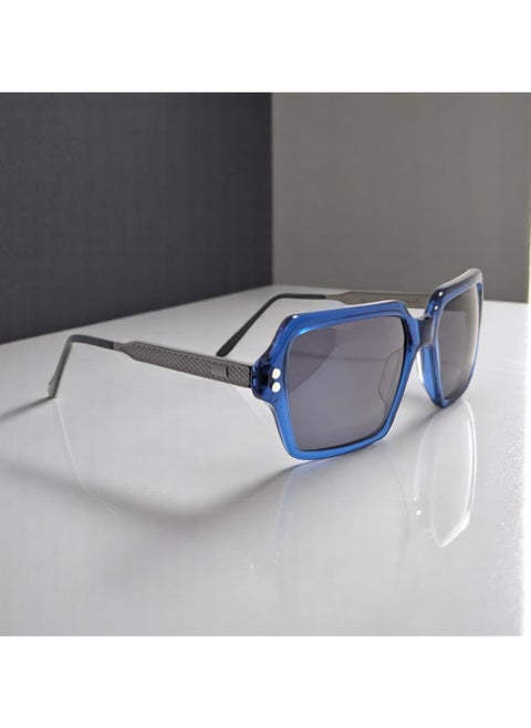 Authentic Armando Cavelli sunglasses, crafted from carefully selected premium acetate for a luxurious look and longevity with extensive use. This model combines modernity and classic style, with a raw blue acetate front and gunmetal -plated metal temples to complete your luxury look. Comes with premium polymer lenses offer UV400 protection in a grey