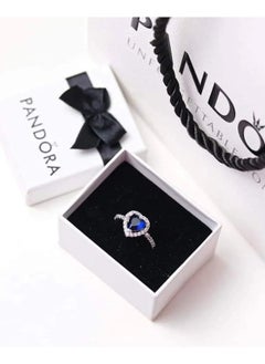 "Unleash Your Inner Radiance: The Pandora Blue Heart Ring - A Dazzling Expression of Elegance and Serenity, Expertly Crafted to Add a Touch of Color and Charm to Any Ensemble, Perfect for Celebrating Life’s Special Moments and Connections."