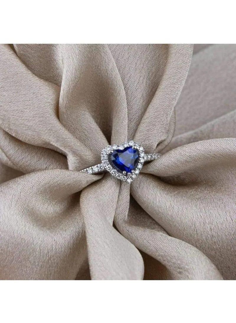 PANDORA - "Unleash Your Inner Radiance: The Pandora Blue Heart Ring - A Dazzling Expression of Elegance and Serenity, Expertly Crafted to Add a Touch of Color and Charm to Any Ensemble, Perfect for Celebrating Life’s Special Moments and Connections." - Image 1