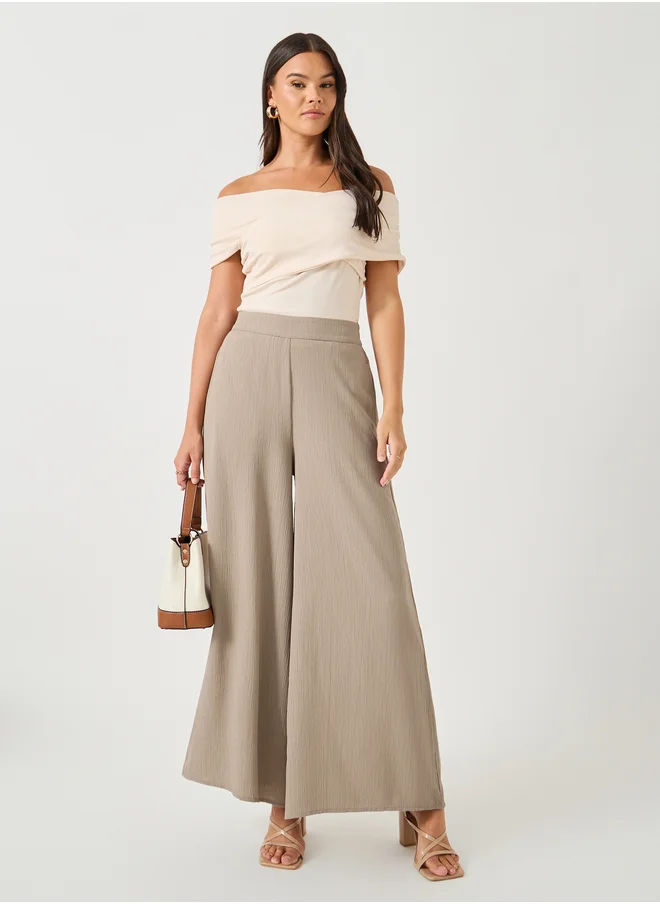 ستايلي Crinkled Flat Front Wide Leg Pants with Side Pockets