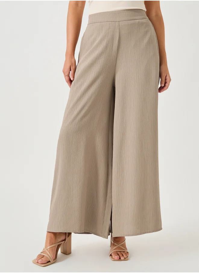 ستايلي Crinkled Flat Front Wide Leg Pants with Side Pockets
