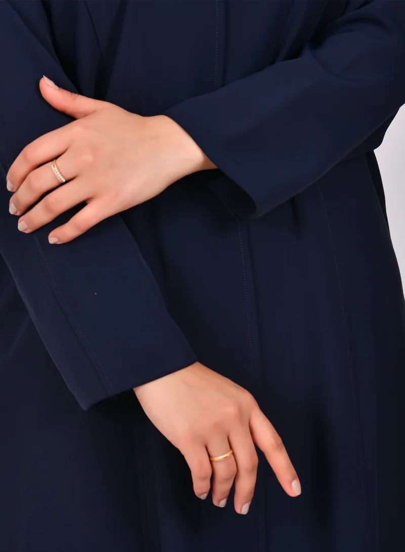 HAWRAA ABAYA Navy blue quarter-cloche wrap abaya with detailed lines and hidden side pockets