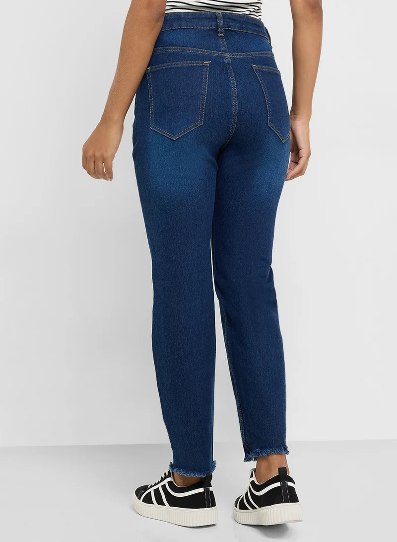 Ginger Ripped High Rise Skinny Jeans With Frayed Hem