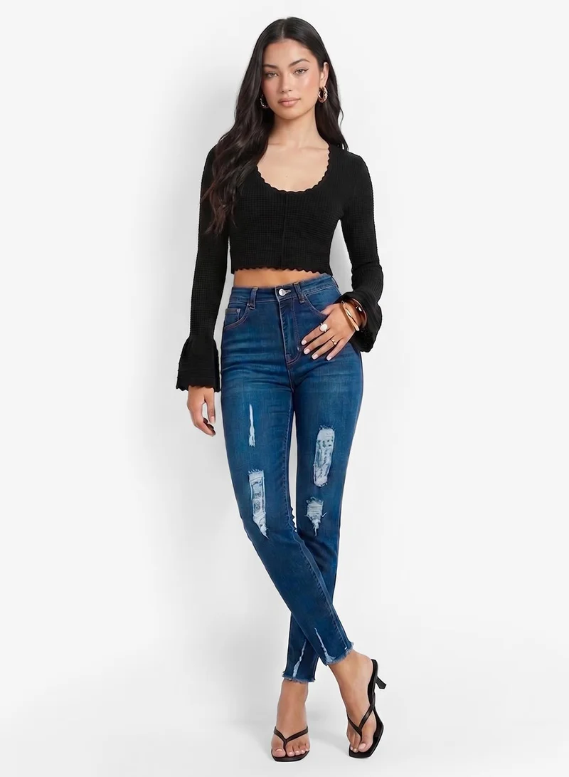 Ripped High Rise Skinny Jeans With Frayed Hem