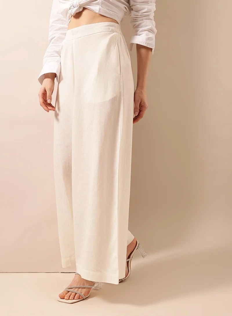 ISHIN  Off White Poly Blend Solid Print Full Length Palazzo Flared Trouser For Women for Women | Best Price UAE