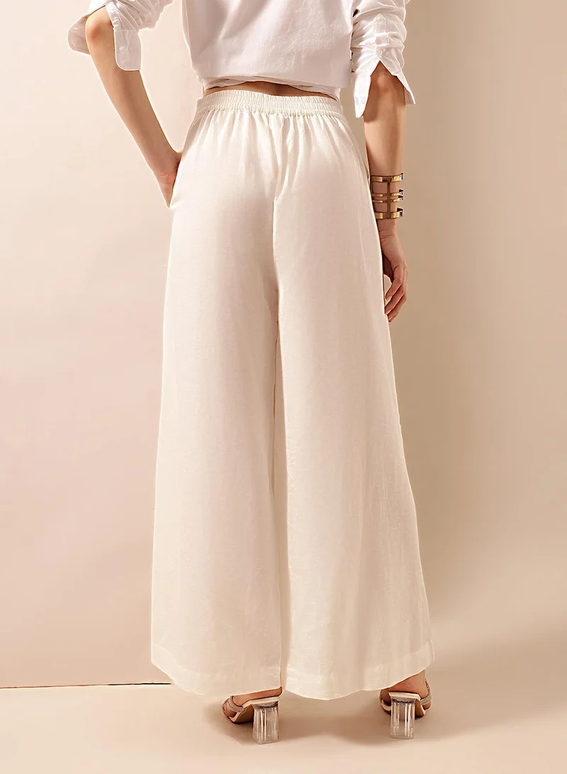 ISHIN  Off White Poly Blend Solid Print Full Length Palazzo Flared Trouser For Women for Women | Best Price UAE