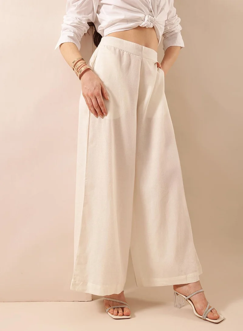 ISHIN Off White Poly Blend Solid Print Full Length Palazzo Flared Trouser For Women
