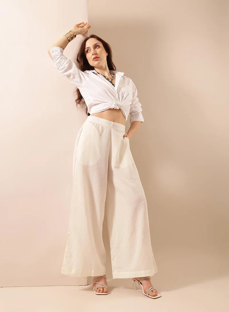ISHIN Off White Poly Blend Solid Print Full Length Palazzo Flared Trouser For Women