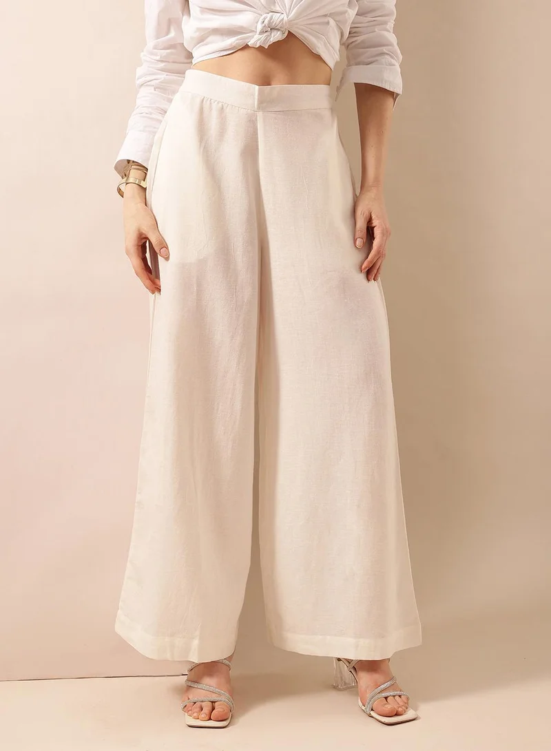 ISHIN  Off White Poly Blend Solid Print Full Length Palazzo Flared Trouser For Women for Women | Best Price UAE