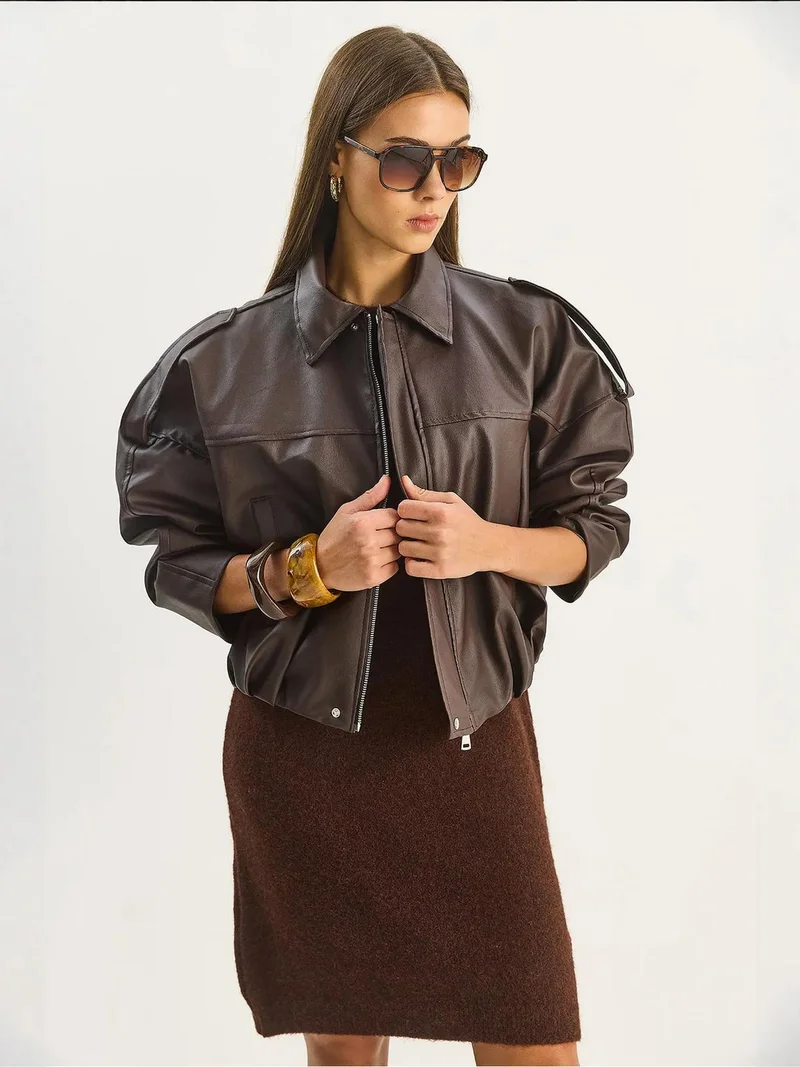 بيانكو لوتشي جاكيت قصير من الجلد الصناعي بقصة واسعة وسحاب من لوتشي