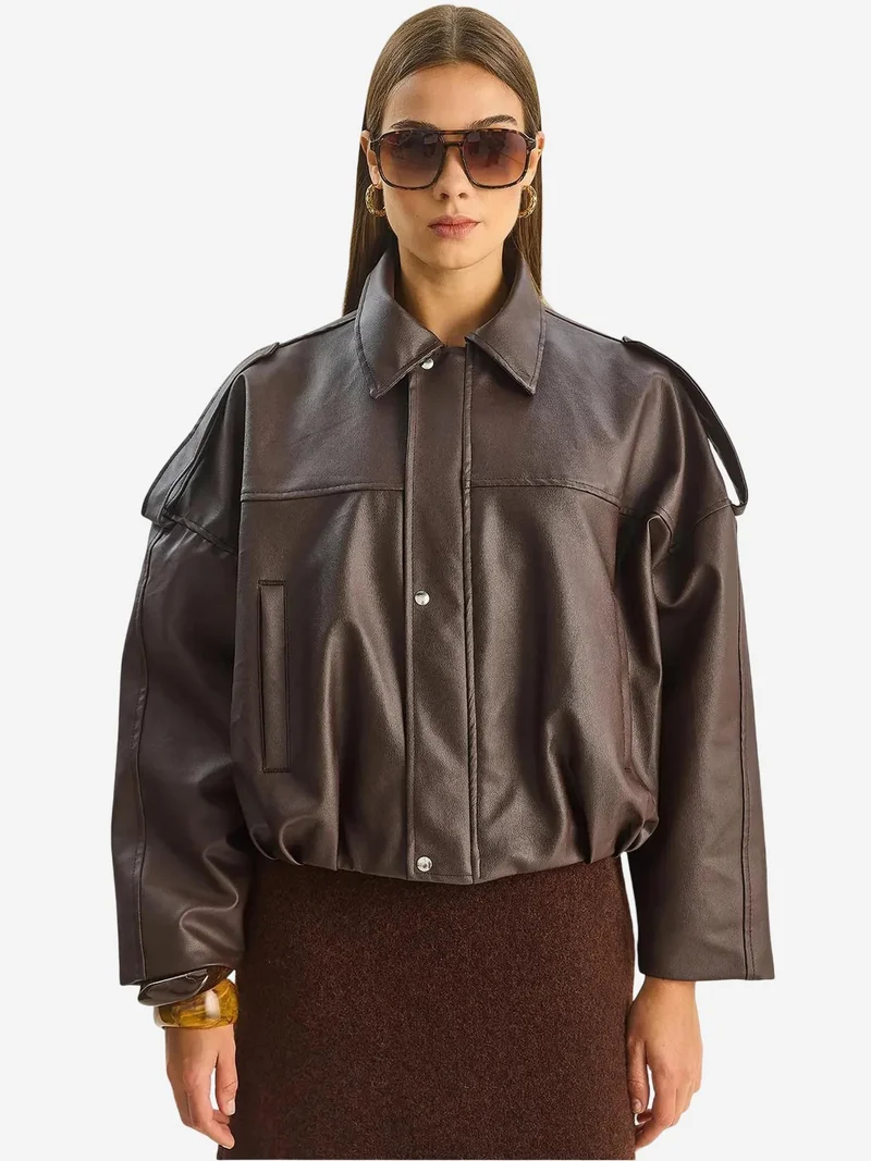 بيانكو لوتشي جاكيت قصير من الجلد الصناعي بقصة واسعة وسحاب من لوتشي