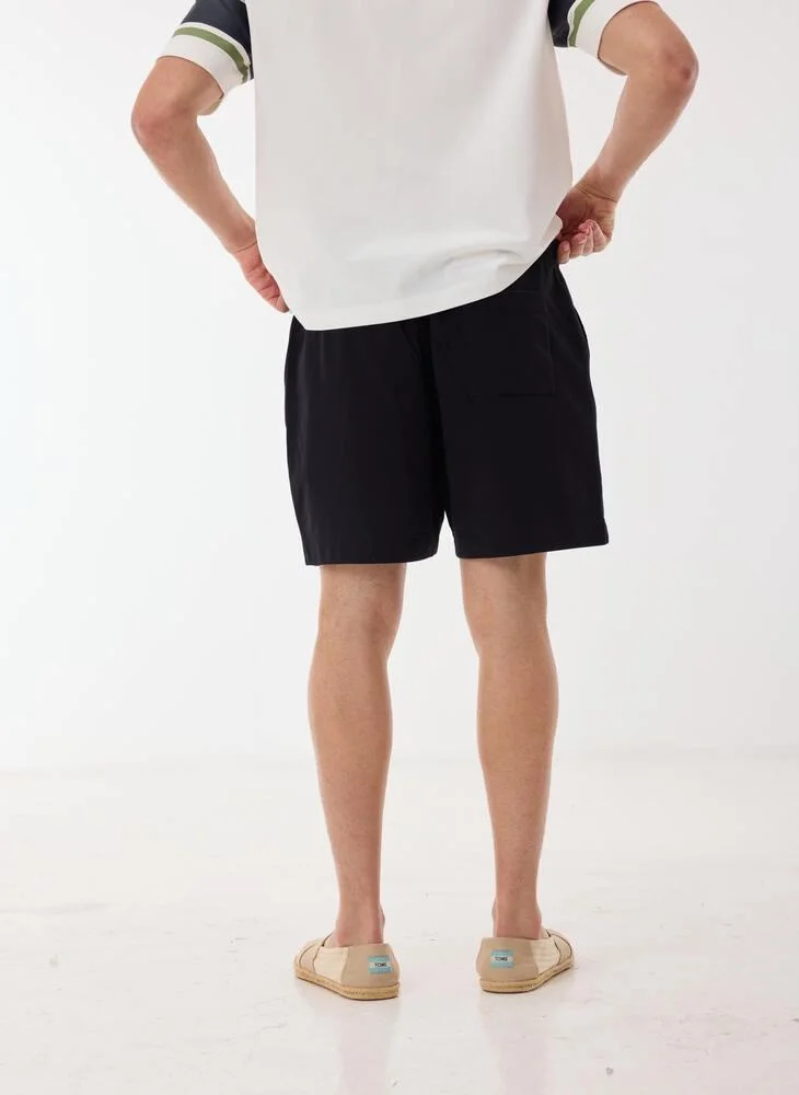 Ashita Fernandes  Solid Drawstring Waist Shorts for Men | Best Price UAE