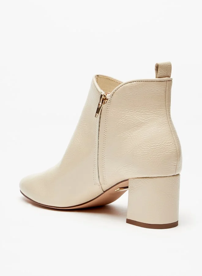 سيليست Women's Solid Ankle Boots with Block Heel and Zip Closure