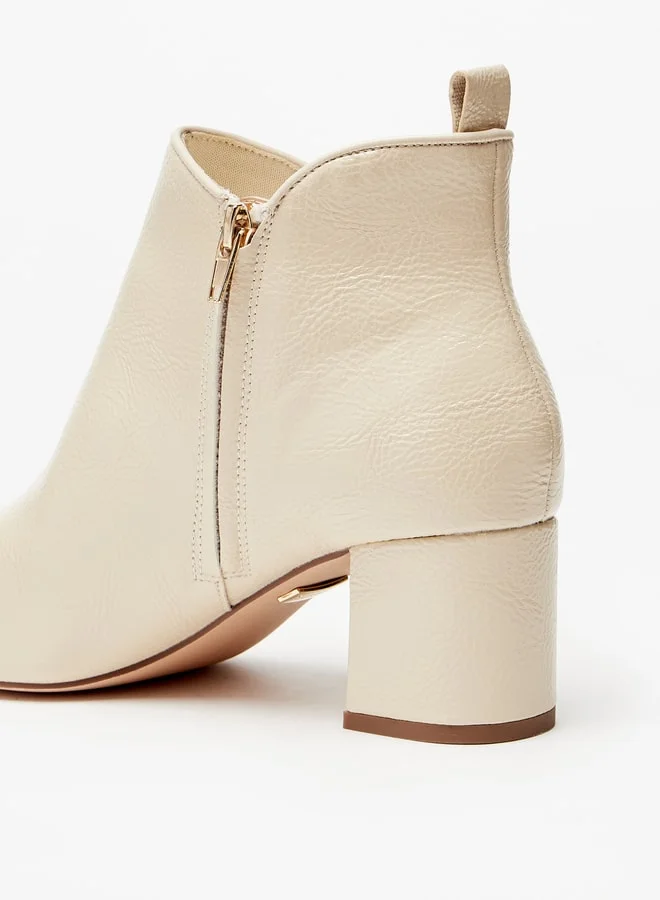 سيليست Women's Solid Ankle Boots with Block Heel and Zip Closure