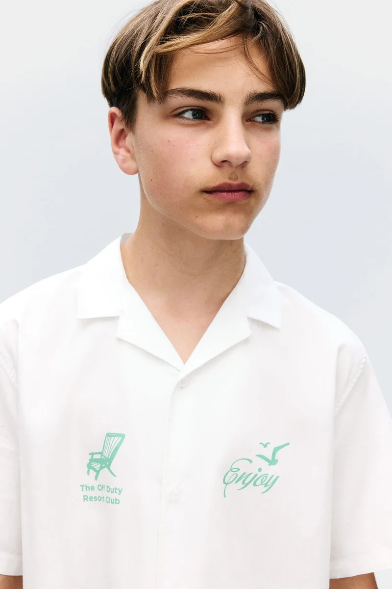 اتش اند ام قميص قطني بياقة ريزورت