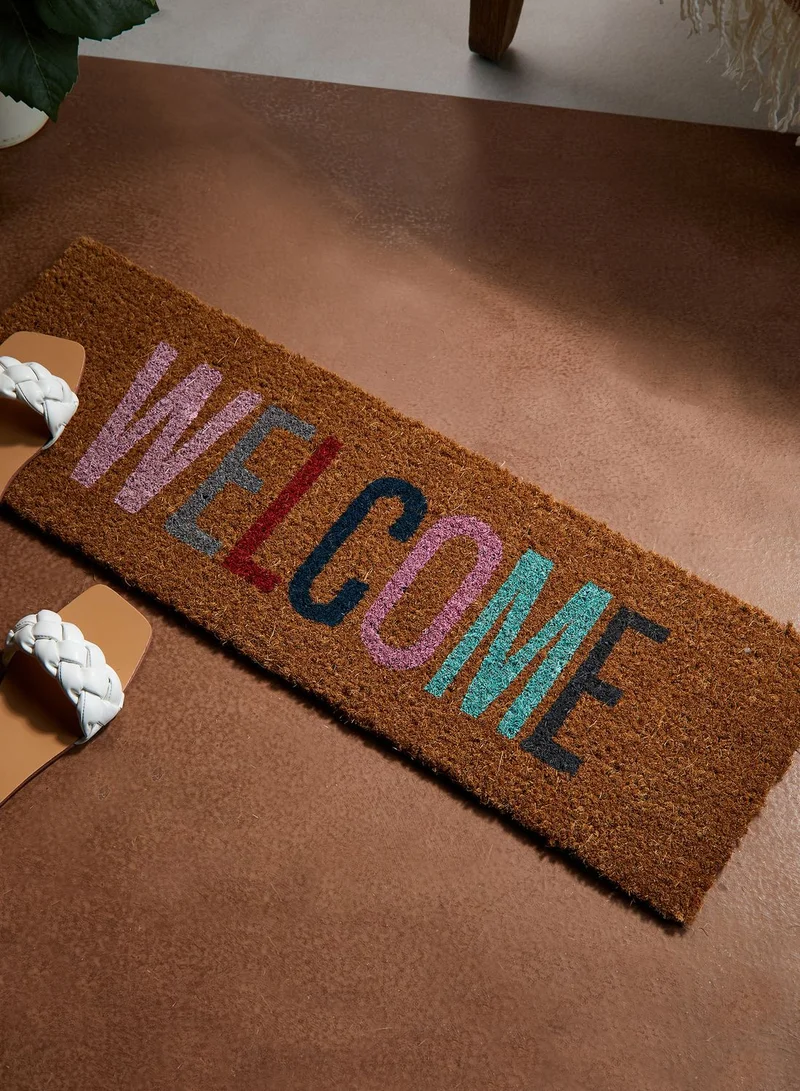 present time Welcome Door Mat