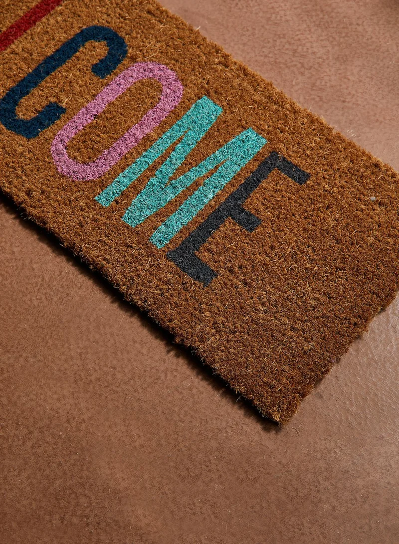 present time Welcome Door Mat