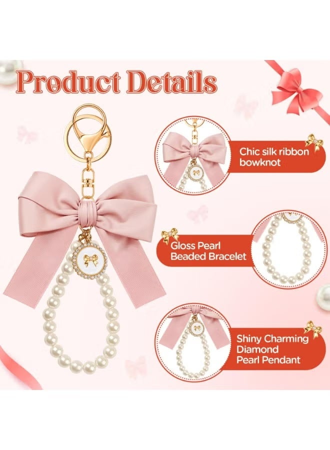 سلسلتا مفاتيح ورديتان مزينتان بفيونكة للنساء، حلقة مفاتيح للمعصم مزينة باللؤلؤ، قلادة لمفاتيح السيارة وحقيبة اليد، إكسسوار أنيق للحقيبة، حامل مفاتيح أنيق للحقيبة وحقيبة اليد وحقيبة الظهر، هدية مثالية للفتيات (وردي فاتح) - Image 2
