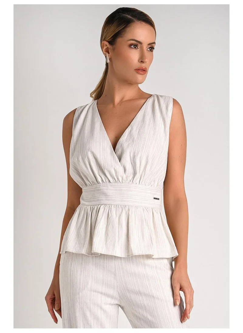 Peplum Blouse with Crossover Neckline