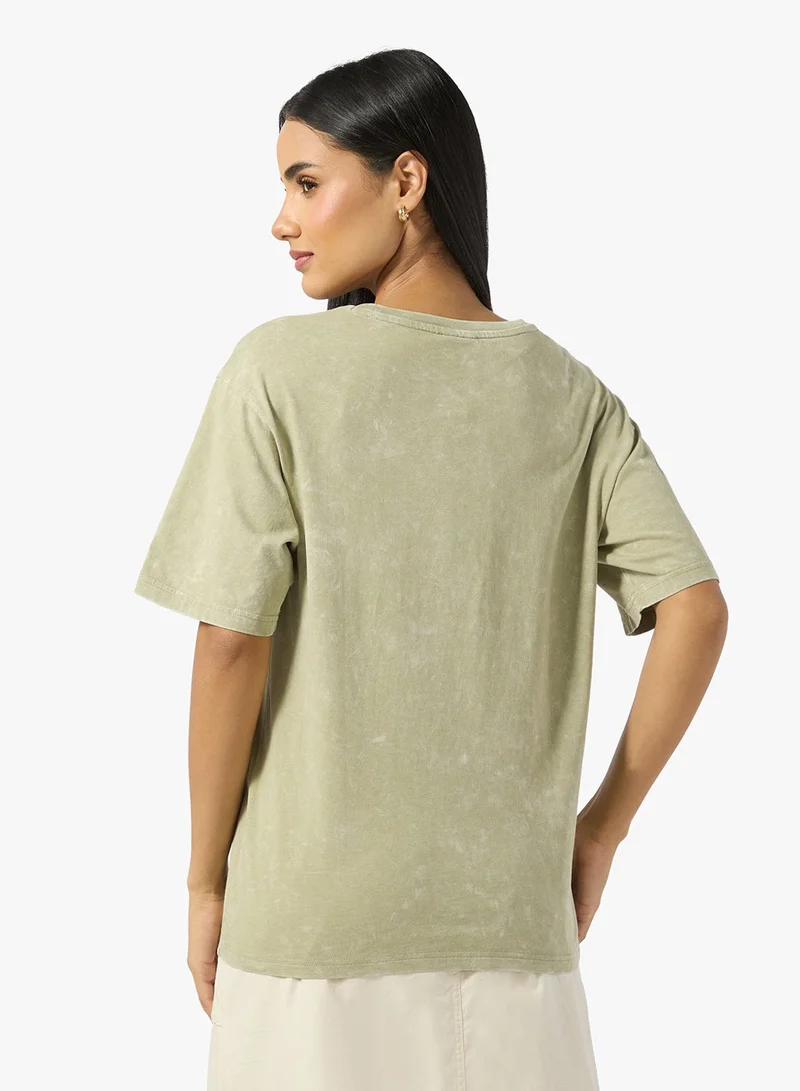 PUMA Elevated Essentials Acid Wash Women's Tee