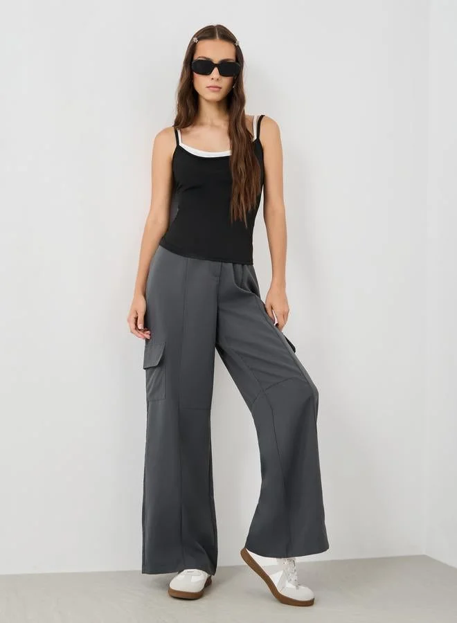 تايك تو توب كامي بحمالات وياقة متباينة بلون سادة