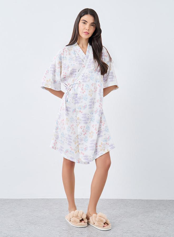 ستايلي روب بتفاصيل ربط جانبية وطبعات زهور شاملة - Image 1