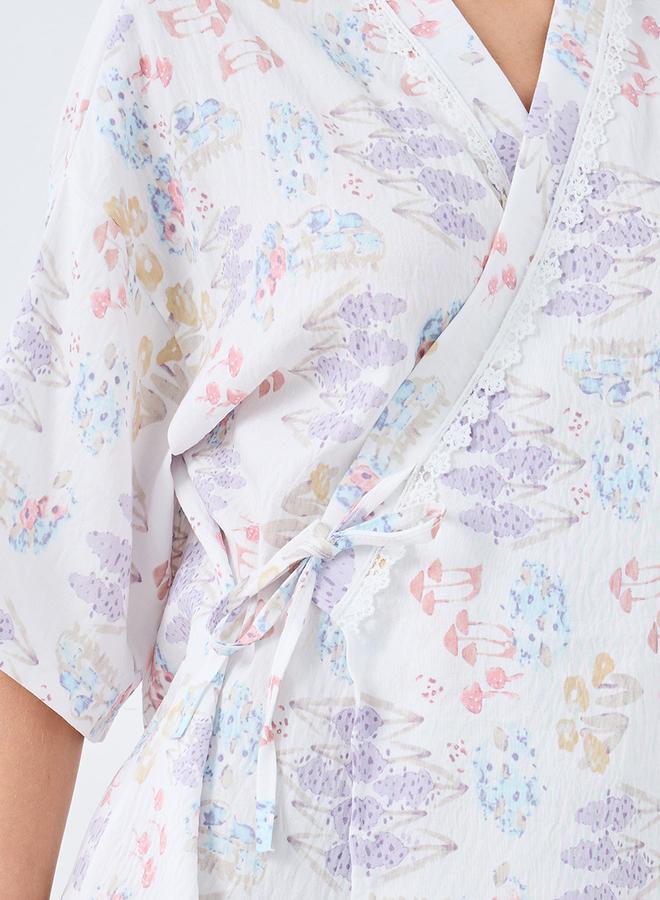 ستايلي روب بتفاصيل ربط جانبية وطبعات زهور شاملة - Image 3