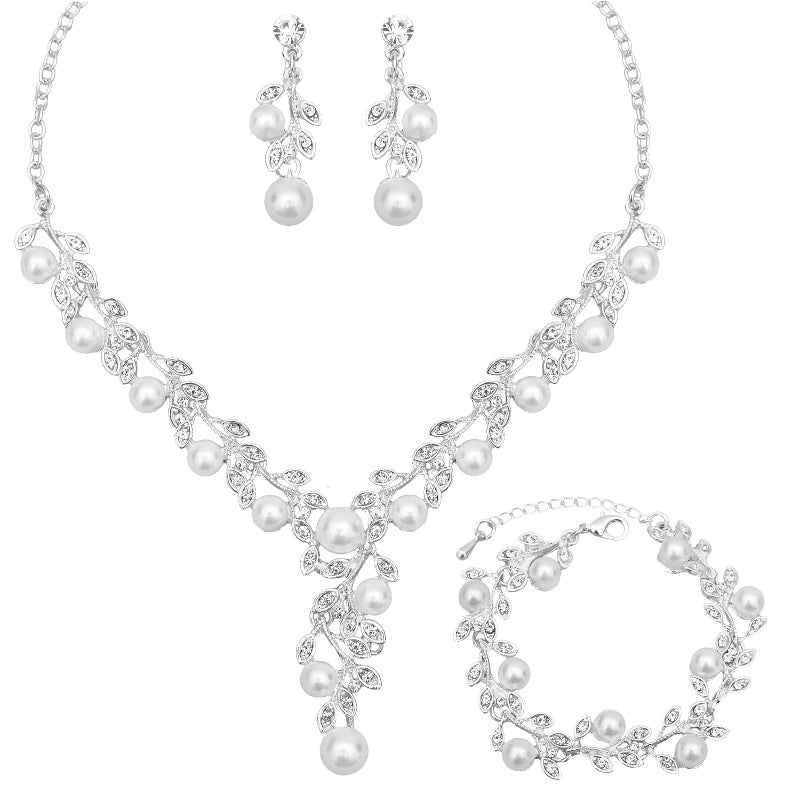CSY Elegant Bridal Necklace Earrings Bracelets Leaves Shape Wedding Prom Dress Accessories White Rhinestones Pearl Jewelry Sets for Bride Bridesmaid (Style #1 - Silver Tone) - Image 1