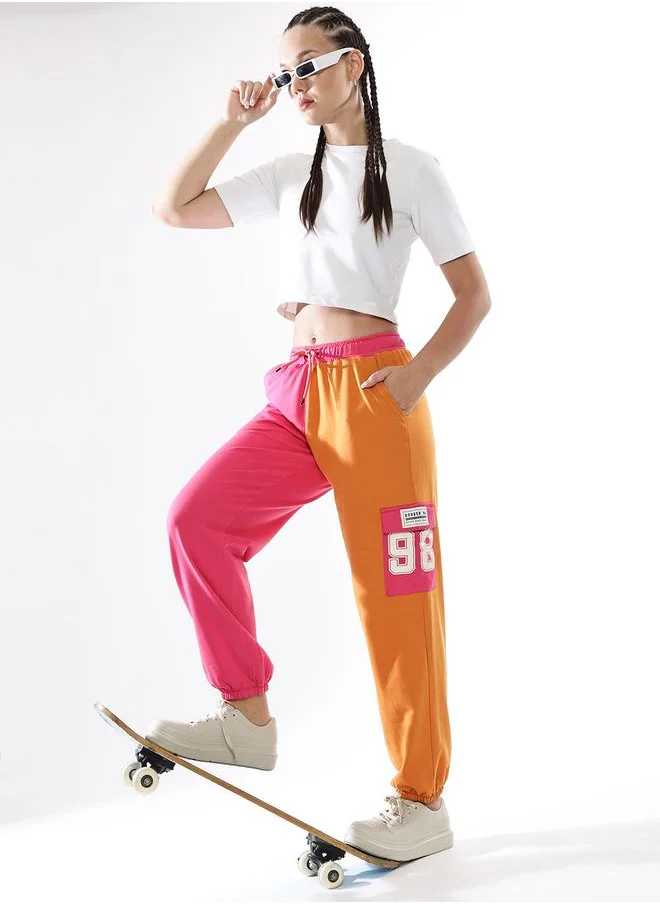 Hubberholme Women Track Pants in Multicolor featuring Jogger fit with a colourblocked pattern, no sleeves, regular length, secured with elasicated + drawstring closure, crafted from terry – a must-have for those who love trendy fashion.