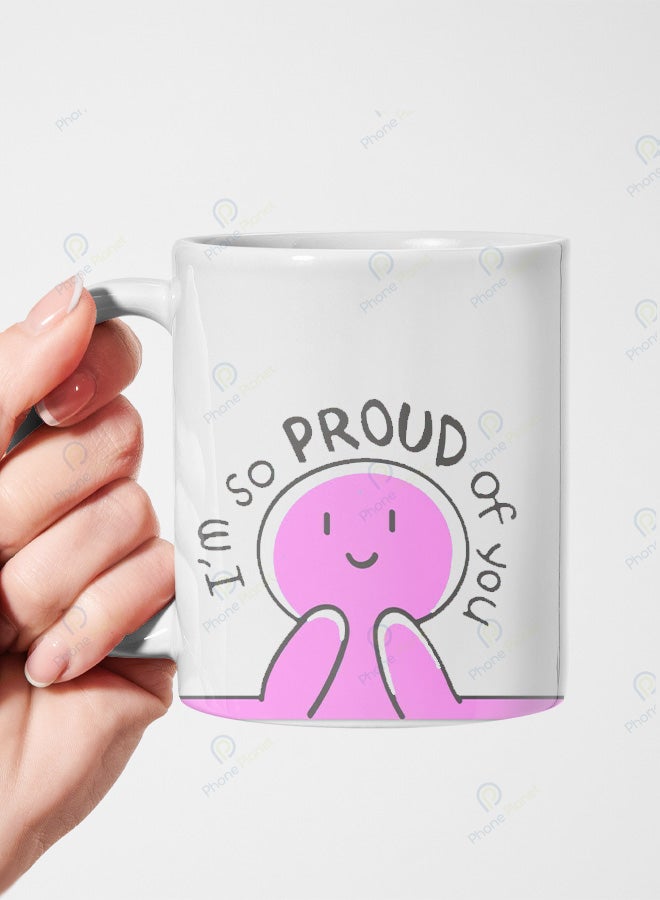 A ceramic mug printed with the phrase I'm so proud of you and featuring a comfortable handle