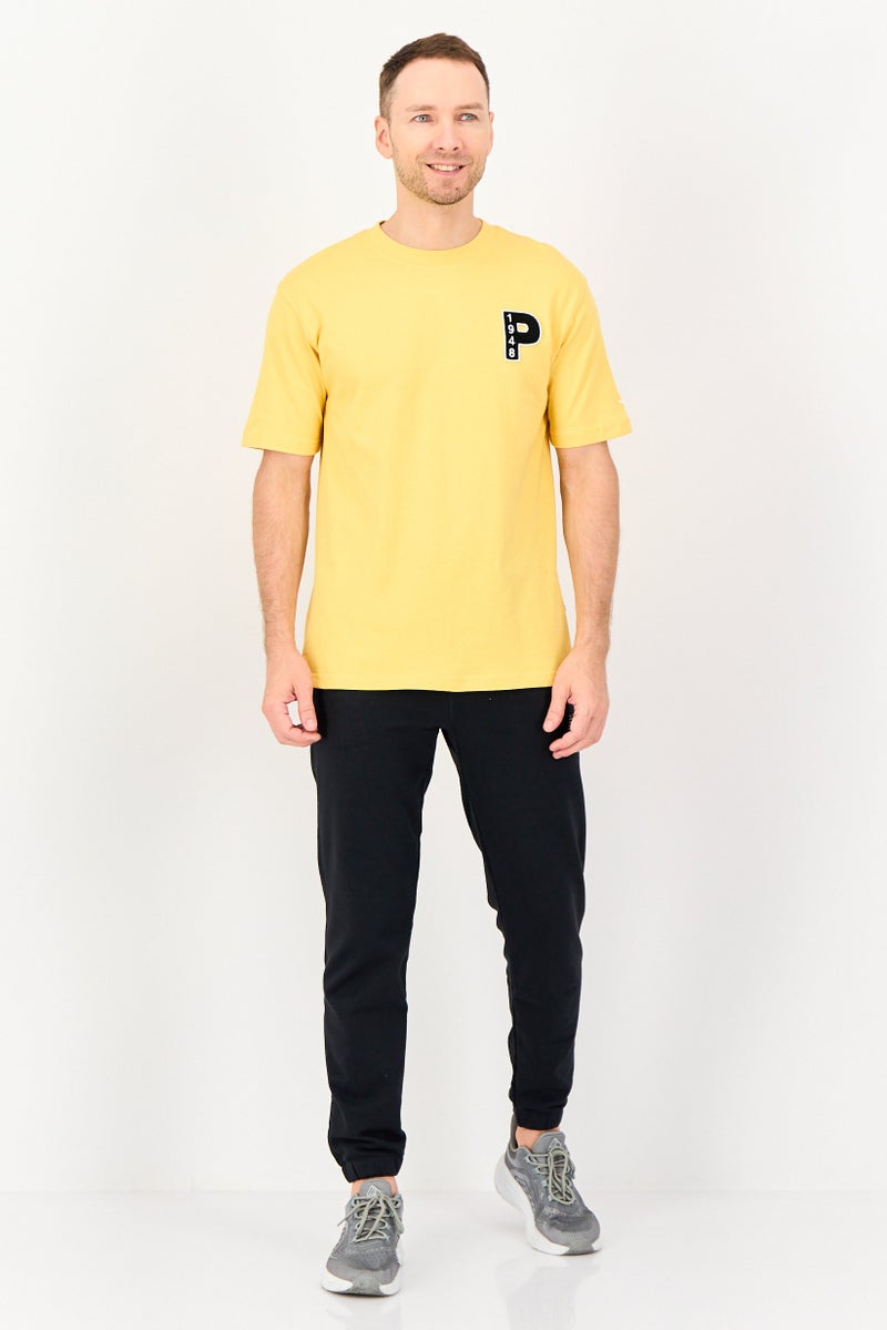 PUMA Men Sportswear Fit Short Sleeve Outdoor T Shirt, Yellow - Image 4