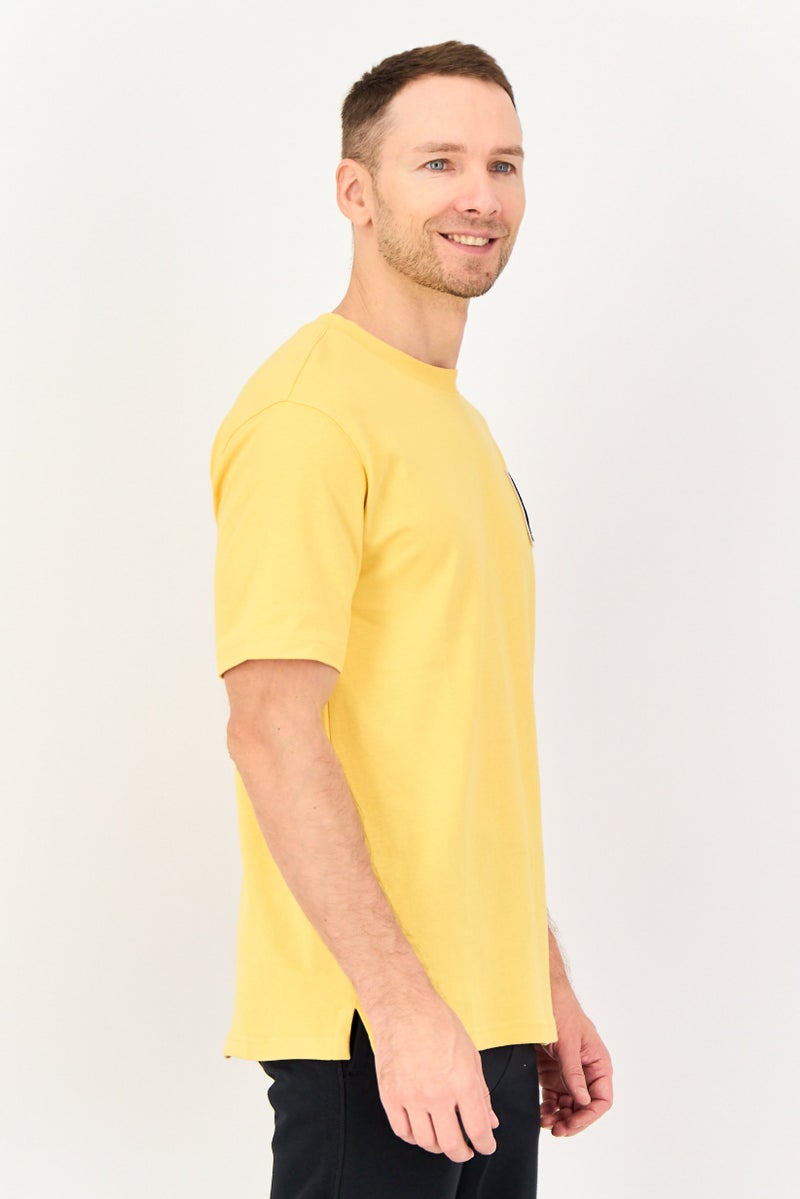 PUMA Men Sportswear Fit Short Sleeve Outdoor T Shirt, Yellow - Image 2