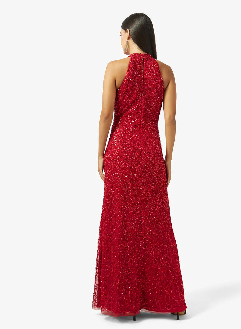 نمشي x فستان مزين بياقة هالتر