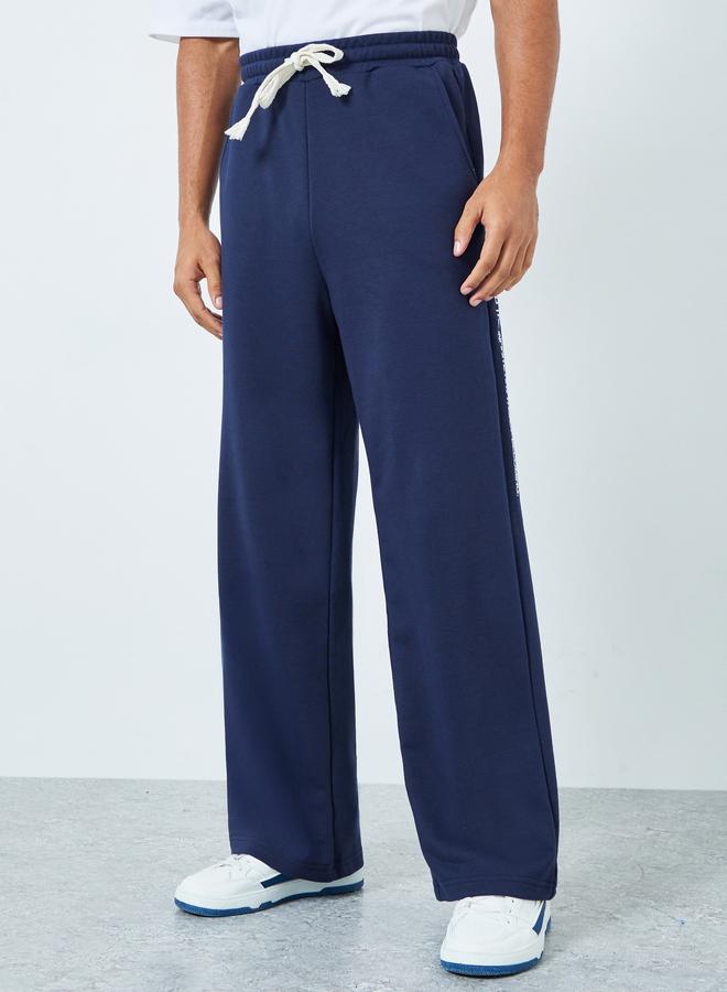 Styli Men Navy Minimal Print Relaxed Fit Joggers - Image 1