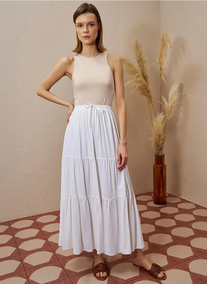 Kayra Layered Hem High-Waist Skirt in Ecru
