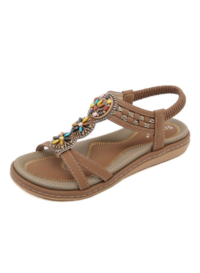 NIBEMINENT Casual Sandals Women's Beach Vacation Summer New Versatile Flat Bottom Elastic Band Water Diamond Roman Beach Shoes  - Image 1