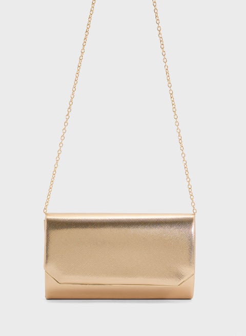 حقيبة يد كلاتش بحواف معدنية