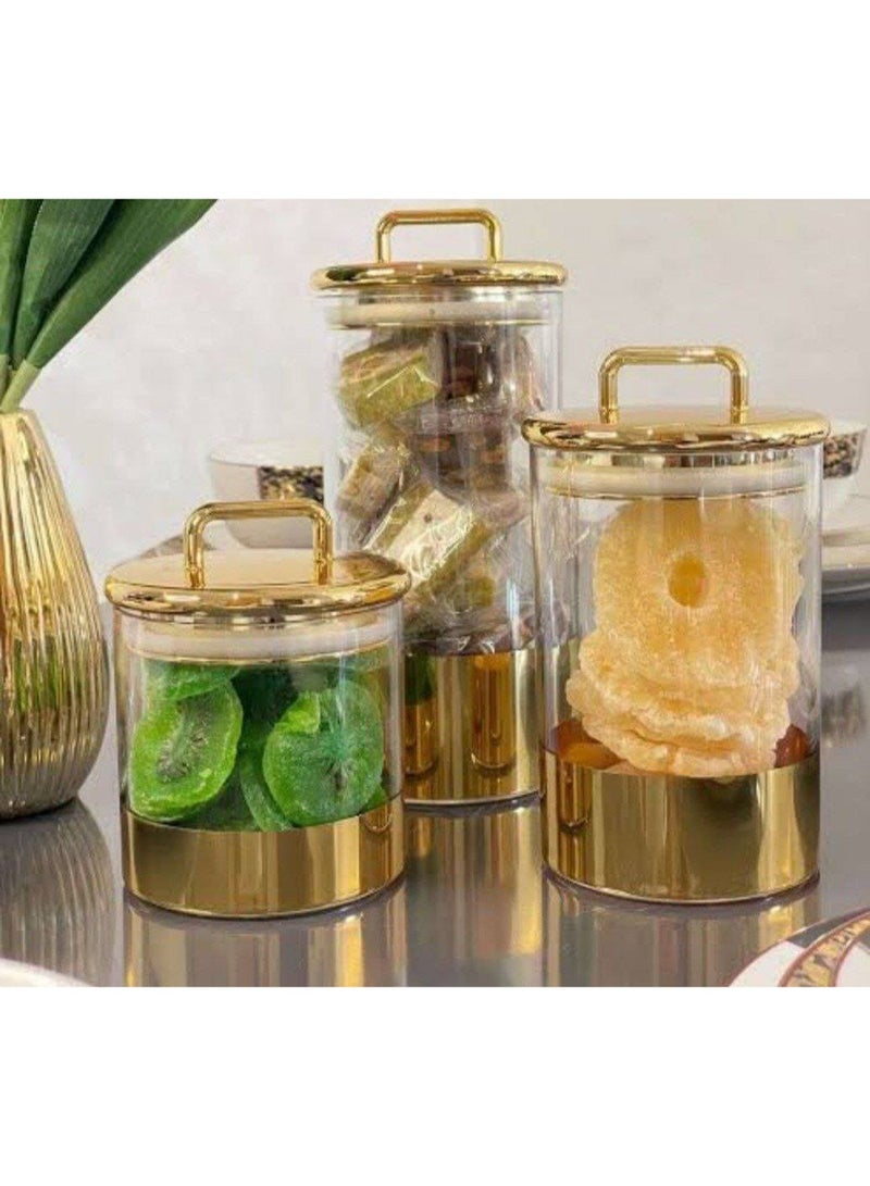 A very chic 3-in-1 jar set consisting of 3 jars of different sizes. Plain acrylic jars with a gold base will impress your guests and are a masterpiece in the coffee corner. They can be used to store tea, sugar, and coffee, as well as candy and nuts, legumes, and pasta. They have a very tight gold-capped lid. A high-quality imported product. A very valuable gift. - Image 1