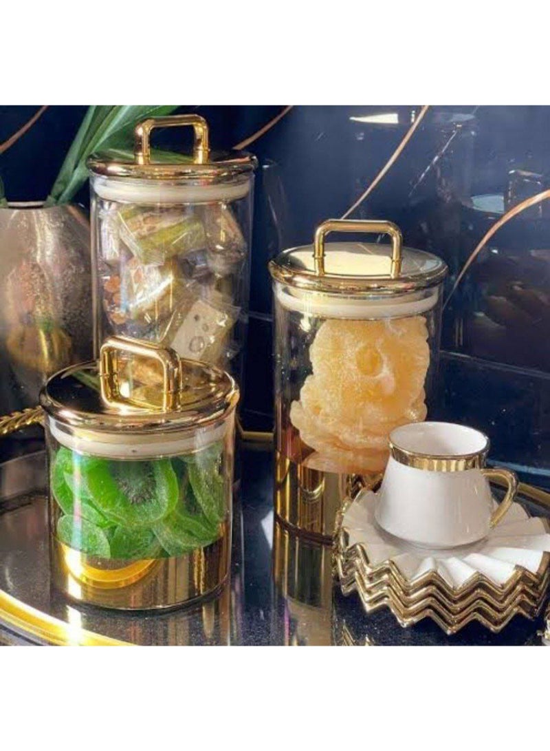 A very chic 3-in-1 jar set consisting of 3 jars of different sizes. Plain acrylic jars with a gold base will impress your guests and are a masterpiece in the coffee corner. They can be used to store tea, sugar, and coffee, as well as candy and nuts, legumes, and pasta. They have a very tight gold-capped lid. A high-quality imported product. A very valuable gift. - Image 3