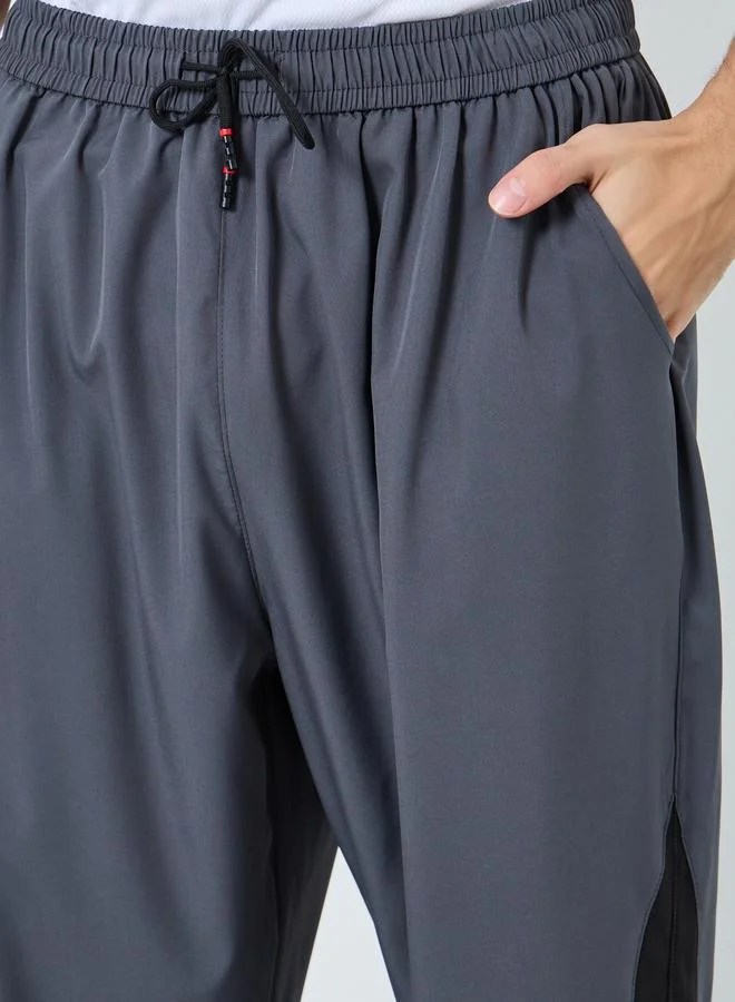 Styli  Styli Men Grey Placement Print Regular Fit Track Pants with Side Panel for Men | Best Price UAE