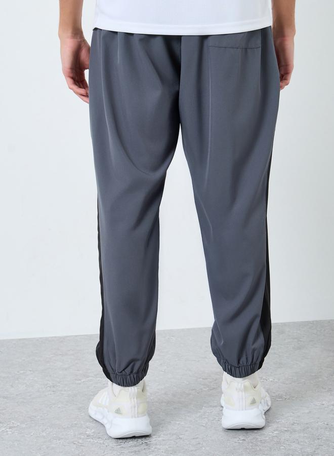 ستايلي اكتيف بنطال رياضي بقصة عادية وشريط جانبي - Image 4