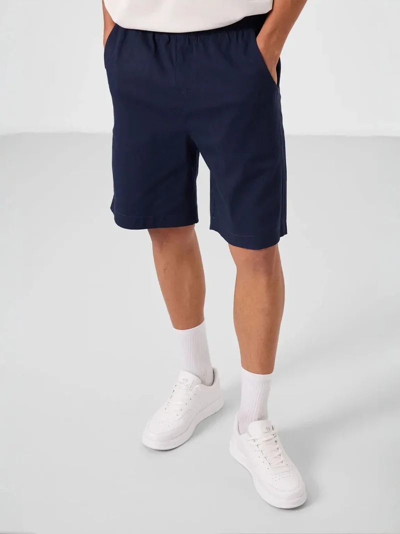 تومي لايف TOMMY Men's Regular Fit Chino Shorts