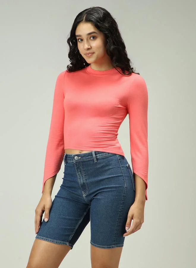 أوجيدر بلوزة وردي ضيقة بحافة غير متماثلة