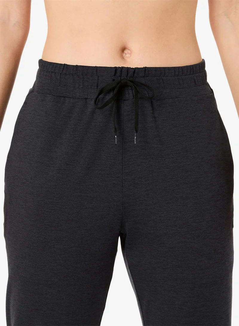 Asics PERFORMANCE BLACK HEATHER Refined Texture Joggers for Women | Best Price UAE