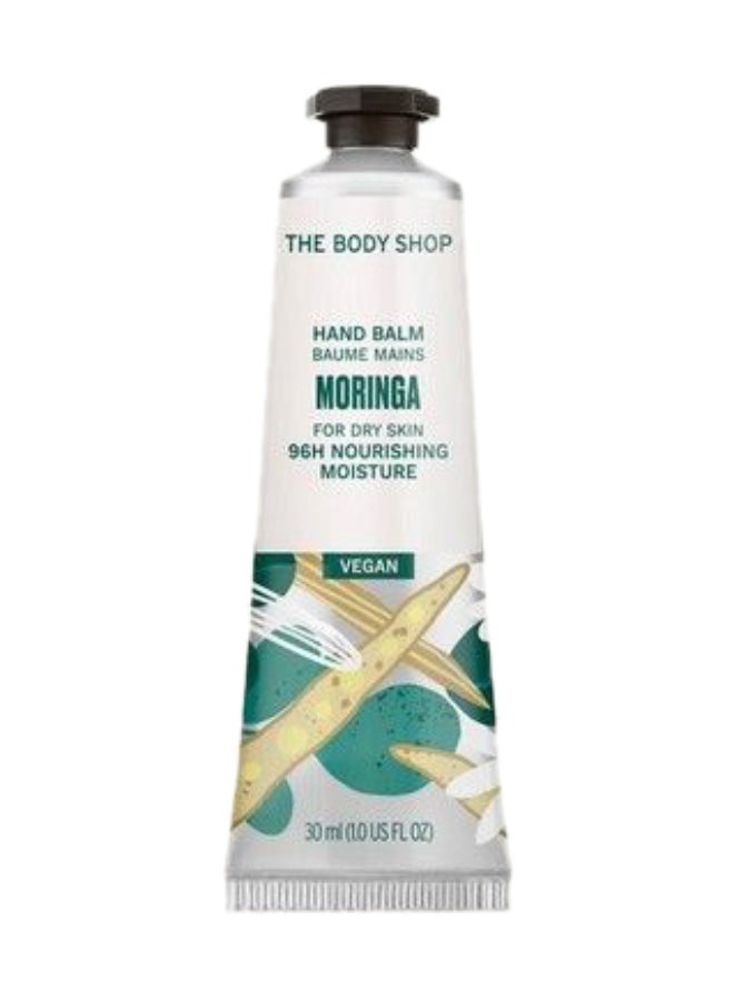THE BODY SHOP Moringa Hand Balm – Intensely Nourishing Hand Cream with Seed Oil & Shea Butter | Soothes Dry, Very Dry Skin, Nails & Cuticles | Non-Greasy, Fast Absorbing, Floral Scent, 96hr Moisture, 30ml - Image 1