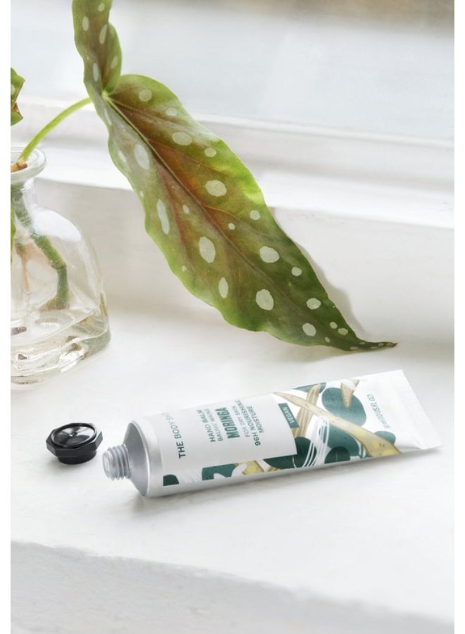 THE BODY SHOP Moringa Hand Balm – Intensely Nourishing Hand Cream with Seed Oil & Shea Butter | Soothes Dry, Very Dry Skin, Nails & Cuticles | Non-Greasy, Fast Absorbing, Floral Scent, 96hr Moisture, 30ml - Image 2