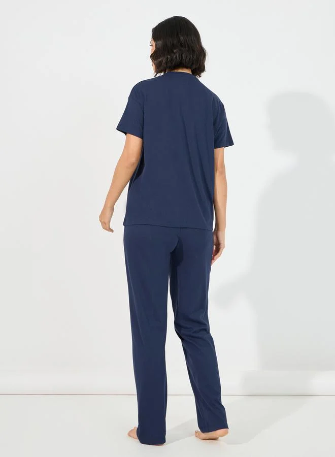 Styli Slogan Pocket Print T-Shirt & Ruffled Waistband Pyjama Set