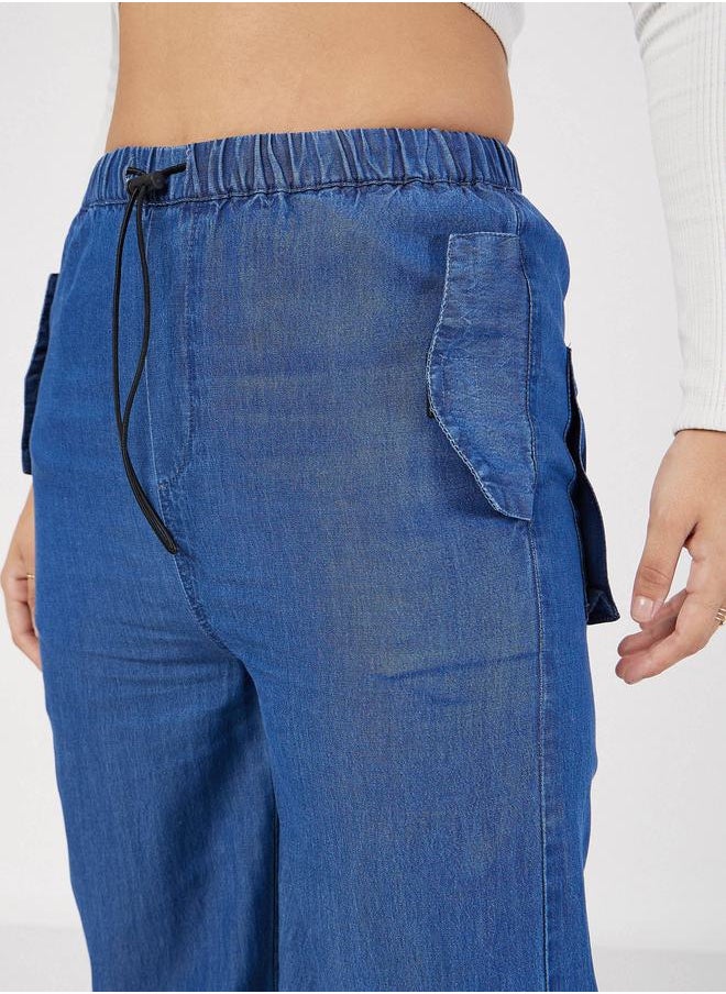 SASSAFRAS - Baggy Fit Cargo Pants with Toggle Detail by Styli - Image 1