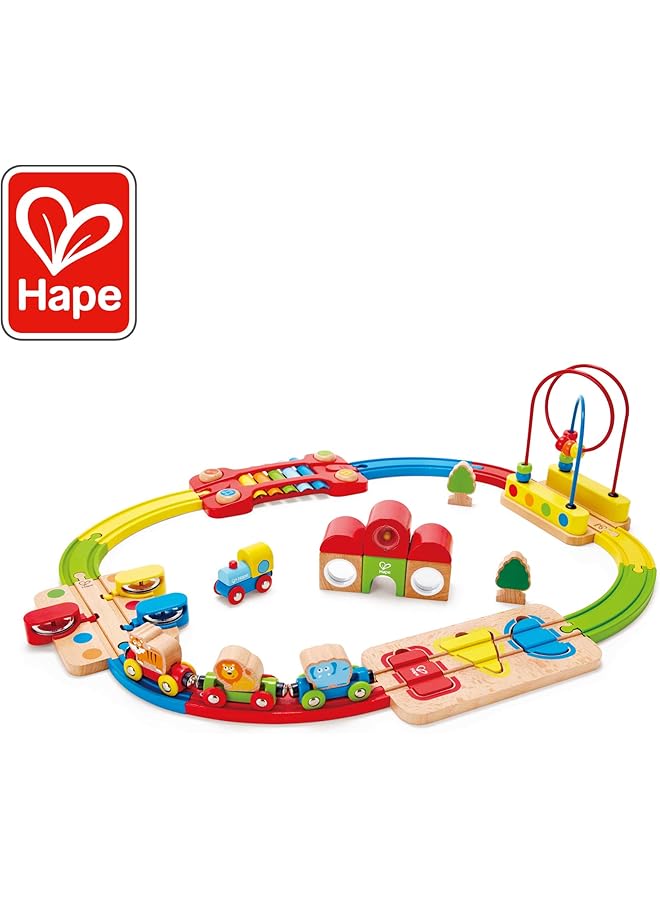 Hape لعبة سكة حديد قوس قزح للأطفال - مجموعة قطار تعليمية للأطفال الصغار - لعبة قطار للأطفال لتطوير المهارات الحركية الأساسية وتعزيز ساعات من اللعب للأطفال من عمر 18 شهرًا فما فوق - Image 1