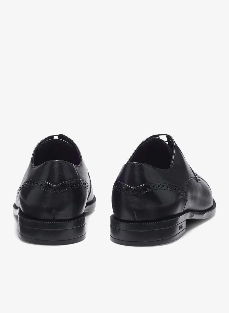 بوس أحذية ديربي جلدية بتفاصيل بروغ